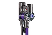 The Dyson V6 Fluffy cordless vacuum cleaner. Convenient docking station. Stores and charges the machine, and holds additional attachments.