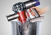 The Dyson V6 Absolute cordless vacuum cleaner. Hygienic bin emptying. Just push the button to release the dirt.