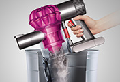 The Dyson V6 Motorhead cordless vacuum cleaner. Hygienic bin emptying. Just push the button to release the dirt.