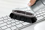 The Dyson V6 Mattress handheld vacuum cleaner. Mini soft dusting brush. Soft bristles for gentle dusting around the home.