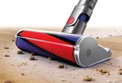 The Dyson V6 Absolute cordless vacuum cleaner. Invented for hard floors. Soft roller cleaner head removes large debris and fine dust simultaneously.
