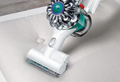 The Dyson V6 Mattress handheld vacuum cleaner. Motorized mattress tool. Agitates and removes dust from upholstery.