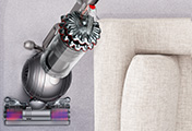 The Dyson Cinetic Big Ball Animal + Allergy upright vacuum cleaner. Ball™ technology. Rides on a ball – steers easily into difficult places.