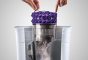 The Dyson Dyson Cinetic Animal canister vacuum cleaner. Hygienic bin emptying. Just push the button to release the dirt.