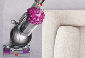 The Dyson Cinetic Big Ball Animal Fuchsia upright vacuum cleaner. Ball™ technology. Rides on a ball – steers easily into difficult places.